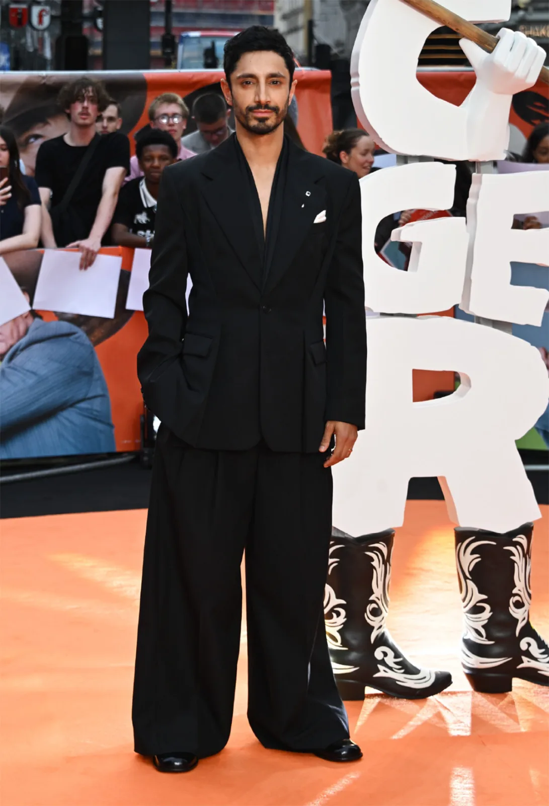 Riz Ahmed wearing Givenchy