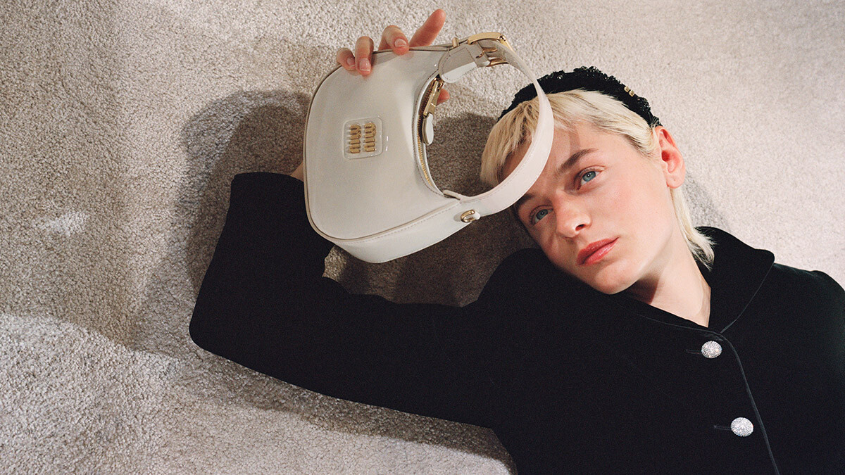 Emma Corrin in Miu Miu Holiday Campaign