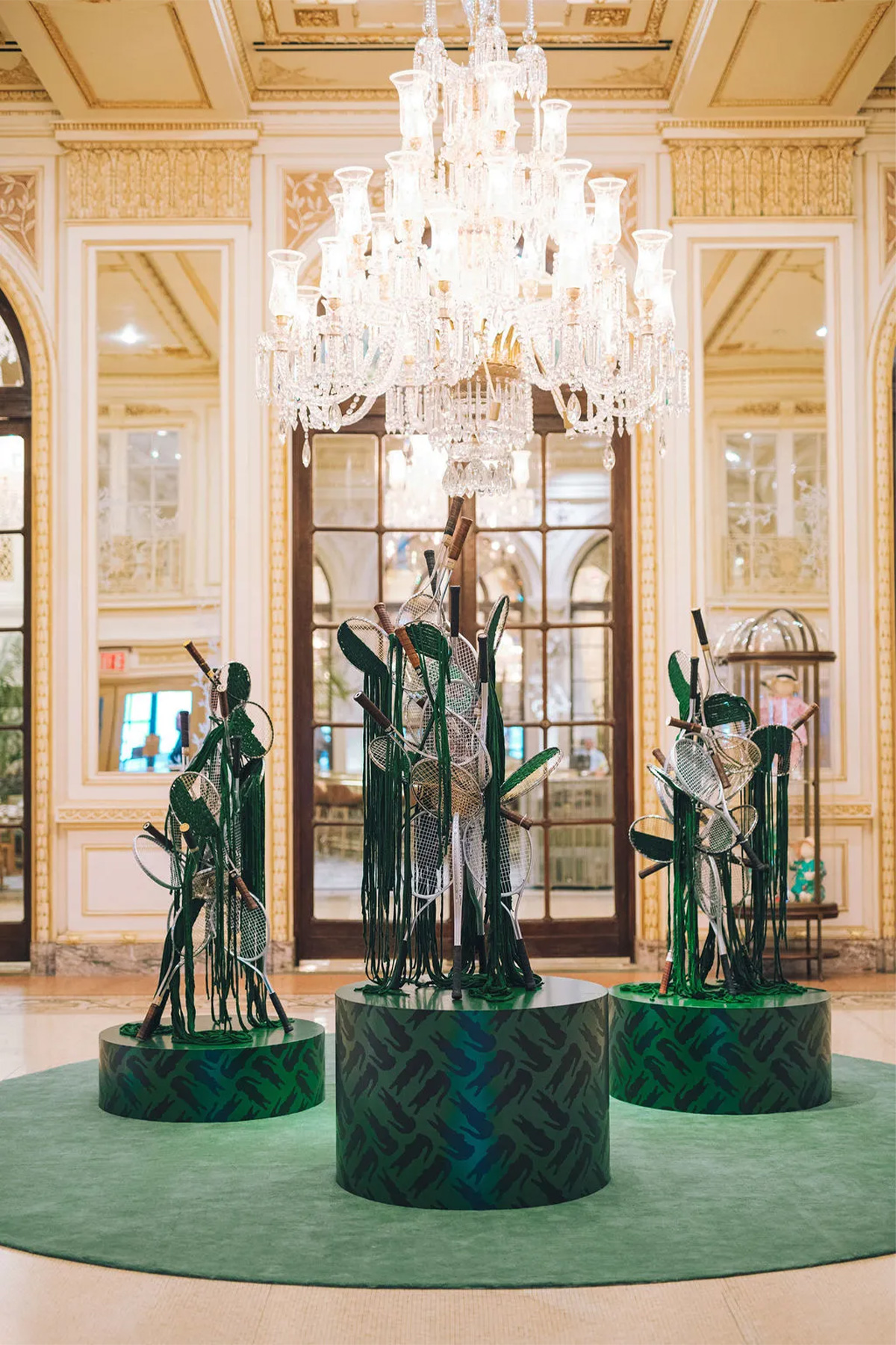 Tennis sculpture in the Plaza’s lobby | Photo by Taylor Miller | Source: Lacoste