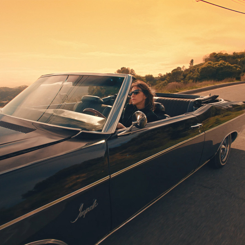 Charlotte Gainsbourg Drives Into Blurry Moon for Saint Laurent